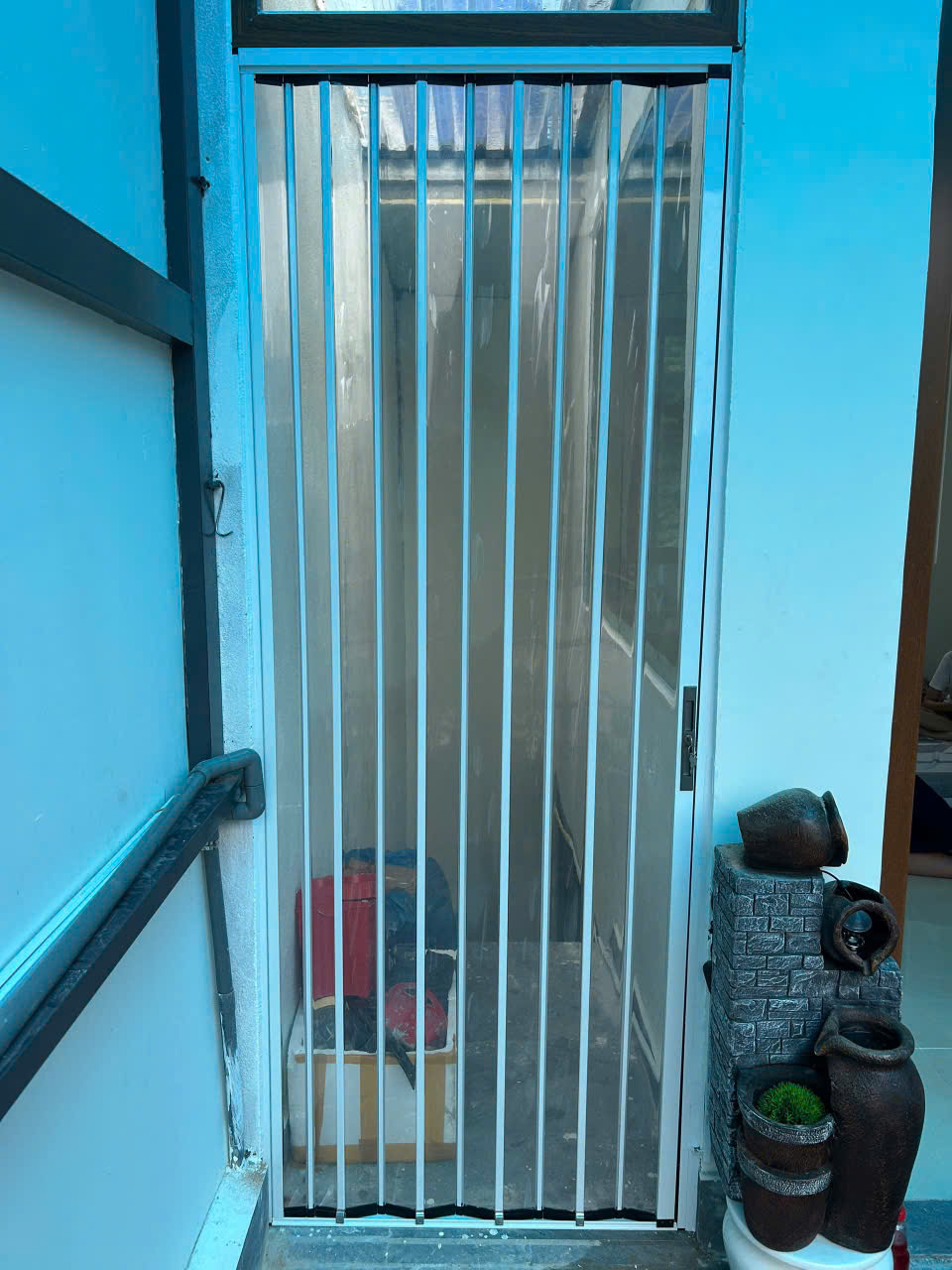 CỬA XẾP LÁ NHỰA TRONG 2